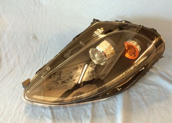 Headlight black - left / Scheinwerfer schwarz - links